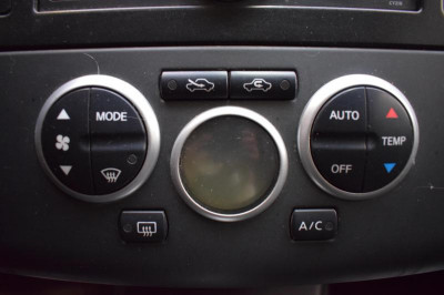 Nissan Tiida 1.6 AT (110 л. с.)