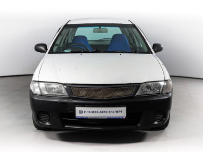 Mazda Familia 1.5 AT (110 л.с.)