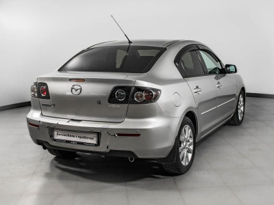 Mazda 3 1.6 AT (105 л. с.)