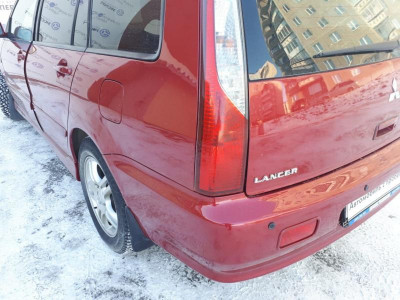 Mitsubishi Lancer 1.6 AT (98 л. с.)