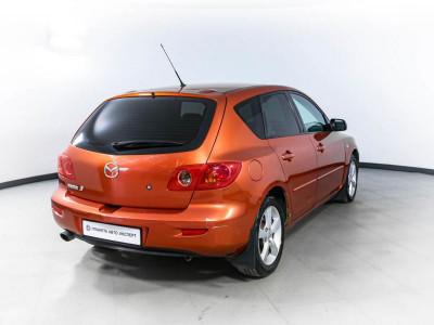 Mazda 3 1.6 MT (105 л. с.)